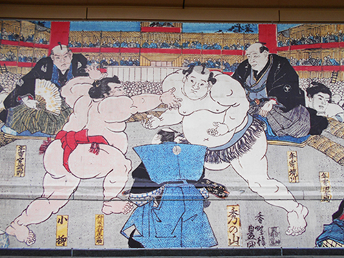 Murale illustrant un combat sumo.