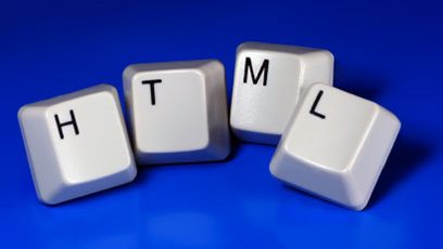 Photographie de touches de clavier écrivant « HTML »